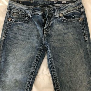 Miss Me Women’s Embossed Cross Boot Cut Jeans